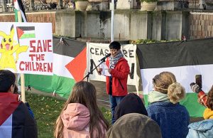 College Green sees third Bristol school strike for Gaza A boy speaking into a microphone in front of a crowd of people