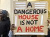 a person holding a sign