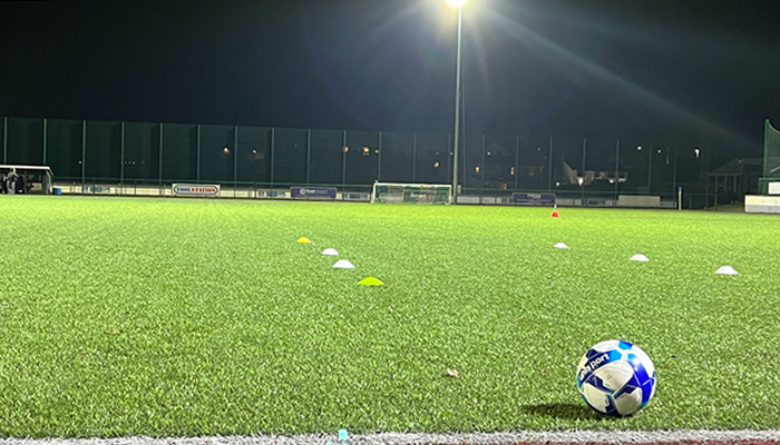 A football on an empty pitch