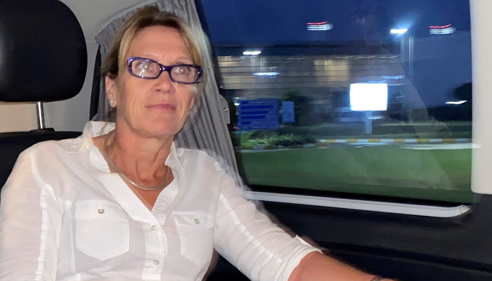 Gaynor Lord, who has been missing for a week is sitting in a car.