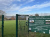 A part of the fence around Stoke Lodge, with a poster from the campaign group.